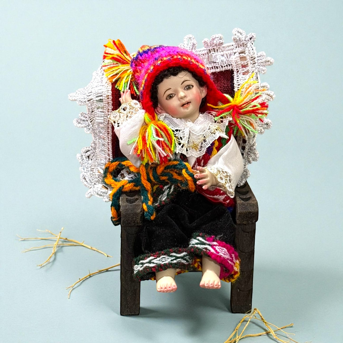 Niño cusqueño sentado 15cm